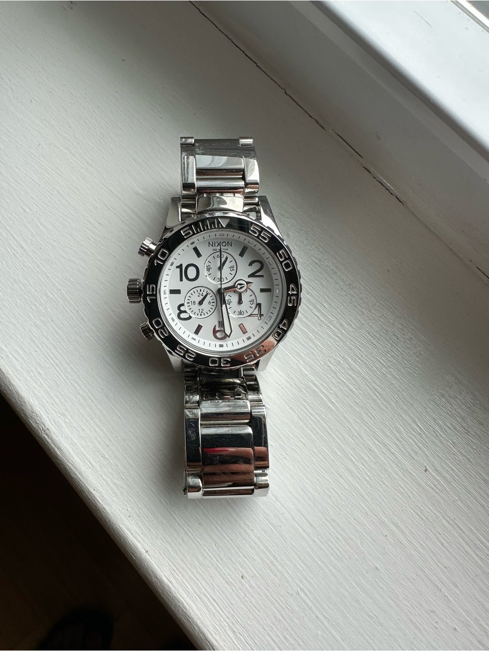 Nixon Silver Stainless Steel Chronograph with White Dial